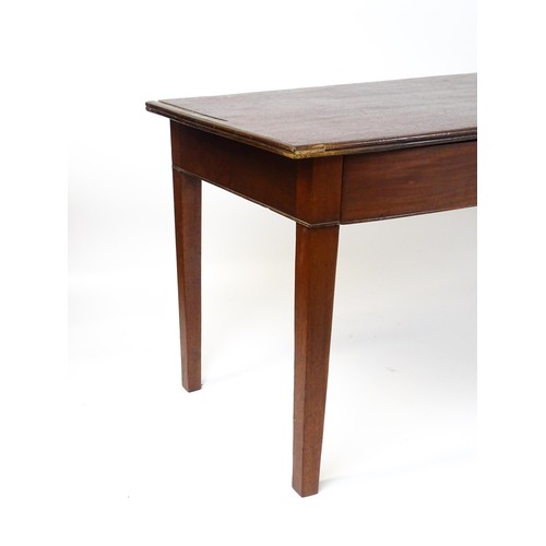 27 - An 18thC mahogany tea table raised on five chamfered tapered legs. 36