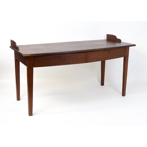 27 - An 18thC mahogany tea table raised on five chamfered tapered legs. 36