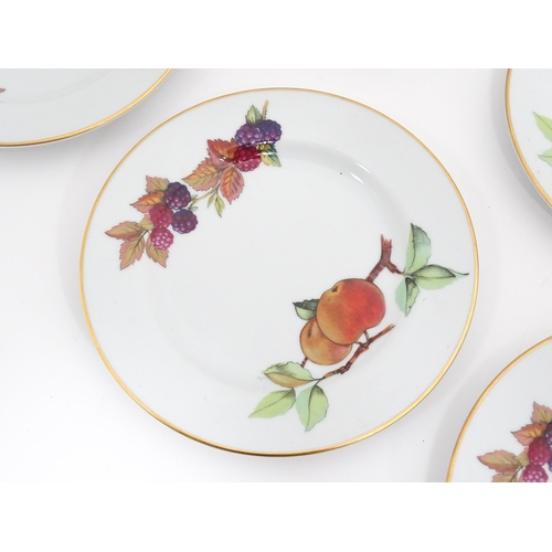 57 - A quantity of Royal Worcester dinner wares in the Evesham pattern to include plates, serving dishes,... 