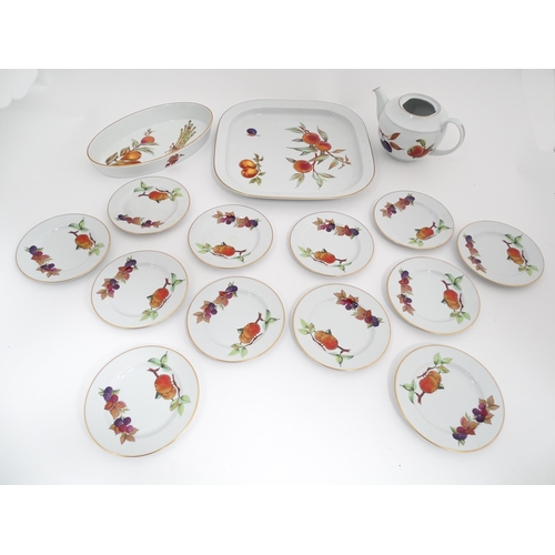 57 - A quantity of Royal Worcester dinner wares in the Evesham pattern to include plates, serving dishes,... 