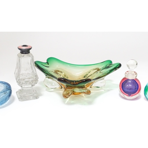 310 - A quantity of assorted studio glassware to include scent bottles, bud vases etc. with a vase having ... 