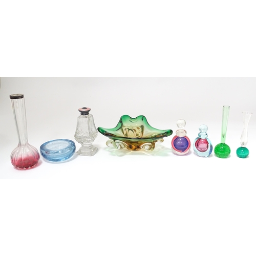 310 - A quantity of assorted studio glassware to include scent bottles, bud vases etc. with a vase having ... 