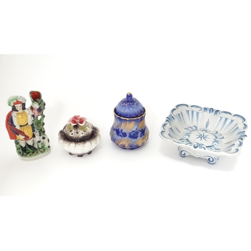 315 - A quantity of assorted ceramics to include a German photograph frame with ceramic surround decorated... 