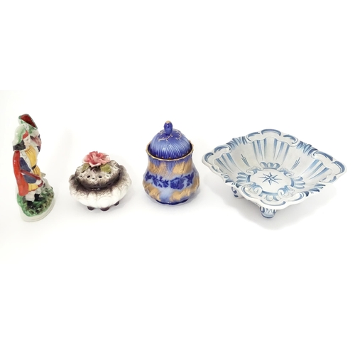 315 - A quantity of assorted ceramics to include a German photograph frame with ceramic surround decorated... 