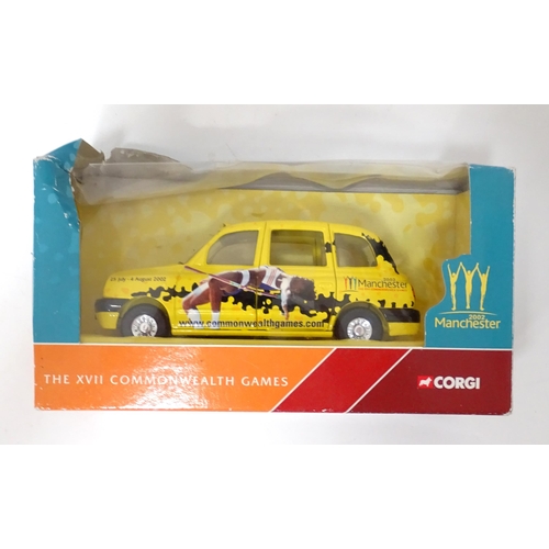 317 - Three Corgi Toys die cast scale model vehicles commemorating the Manchester 2002 Commonwealth Games ... 