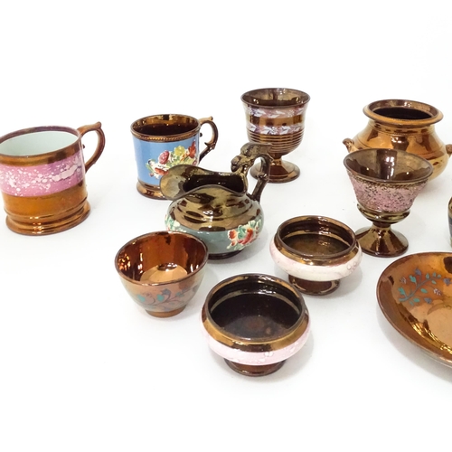 324 - A quantity of assorted lustre ware items to include jugs, tankards, mugs, goblets, vase, etc. To inc... 