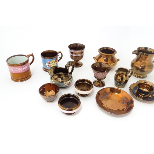 324 - A quantity of assorted lustre ware items to include jugs, tankards, mugs, goblets, vase, etc. To inc... 