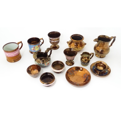 324 - A quantity of assorted lustre ware items to include jugs, tankards, mugs, goblets, vase, etc. To inc... 