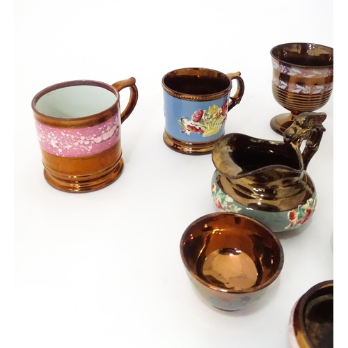 324 - A quantity of assorted lustre ware items to include jugs, tankards, mugs, goblets, vase, etc. To inc... 