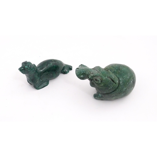 636 - A quantity of 20thC carved models of animals to include elephant, dolphin, seal, rhinoceros, etc. To... 