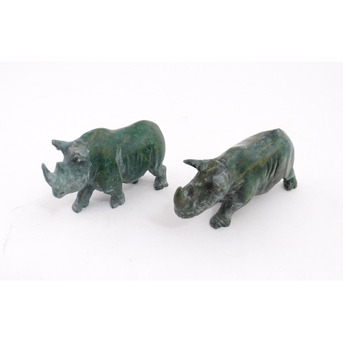 636 - A quantity of 20thC carved models of animals to include elephant, dolphin, seal, rhinoceros, etc. To... 