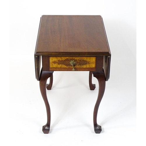 660 - A mid / late 20thC mahogany drop flap table raised on four cabriole legs. 18 1/2