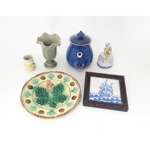 693 - A quantity of assorted ceramics to include a Denby teapot, a majolica plate with leaf detail, a pede... 