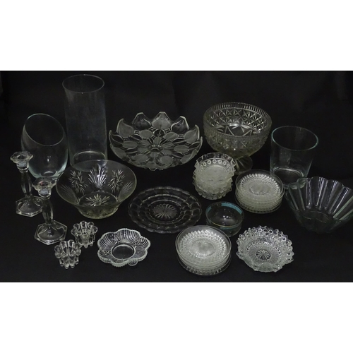 258 - A quantity of assorted 20thC and later glassware to include candlesticks, saucers, bon bon dishes, v... 