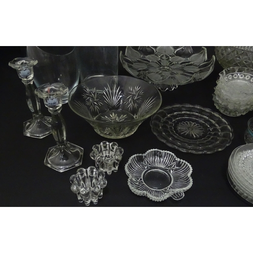 258 - A quantity of assorted 20thC and later glassware to include candlesticks, saucers, bon bon dishes, v... 