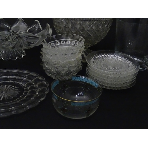 258 - A quantity of assorted 20thC and later glassware to include candlesticks, saucers, bon bon dishes, v... 