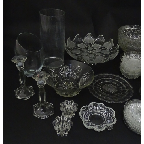 258 - A quantity of assorted 20thC and later glassware to include candlesticks, saucers, bon bon dishes, v... 