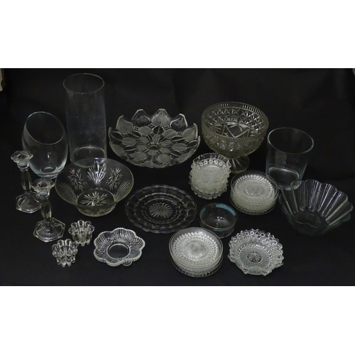 258 - A quantity of assorted 20thC and later glassware to include candlesticks, saucers, bon bon dishes, v... 