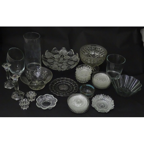 258 - A quantity of assorted 20thC and later glassware to include candlesticks, saucers, bon bon dishes, v... 