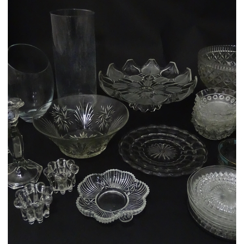 258 - A quantity of assorted 20thC and later glassware to include candlesticks, saucers, bon bon dishes, v... 