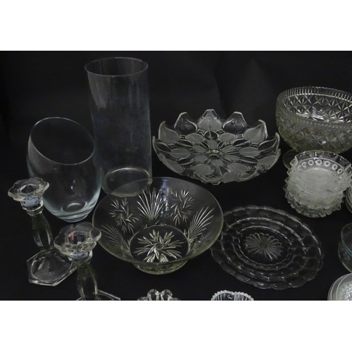 258 - A quantity of assorted 20thC and later glassware to include candlesticks, saucers, bon bon dishes, v... 