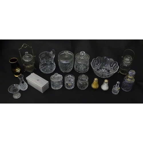 322 - A quantity of assorted cut glass cruets, preserve jars etc. The largest approx 8