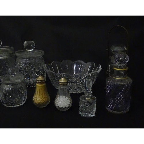 322 - A quantity of assorted cut glass cruets, preserve jars etc. The largest approx 8