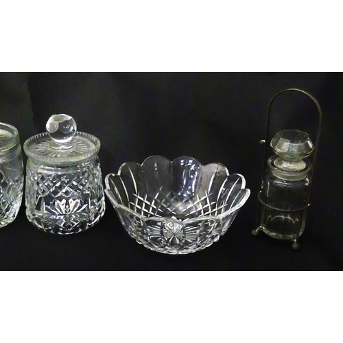 322 - A quantity of assorted cut glass cruets, preserve jars etc. The largest approx 8