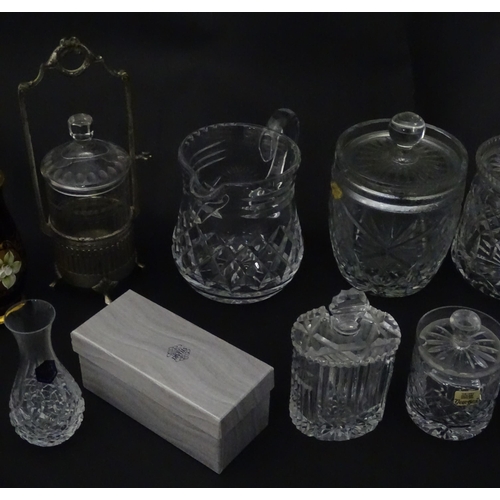 322 - A quantity of assorted cut glass cruets, preserve jars etc. The largest approx 8