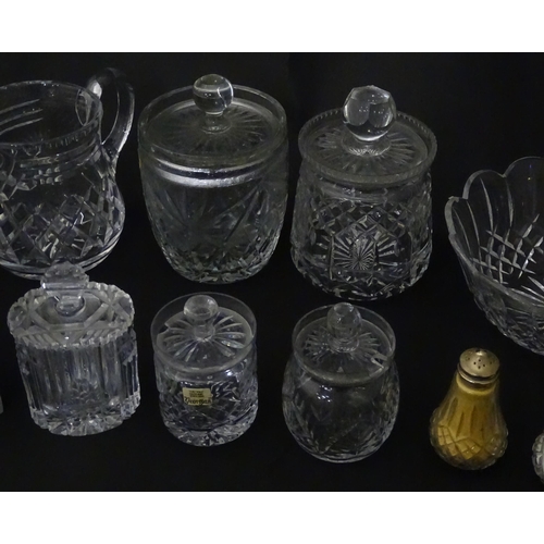 322 - A quantity of assorted cut glass cruets, preserve jars etc. The largest approx 8