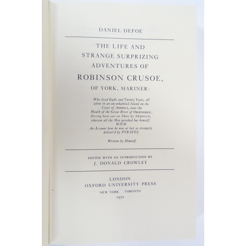 529 - Books: Five assorted hardback books, comprising 'Robinson Crusoe' by Daniel Defoe 1972, 'Black Misch... 