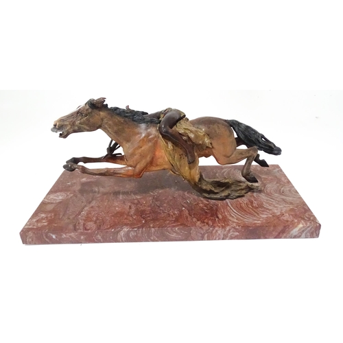 346 - A late 20thC model of a Native American on horseback. Approx. 13 1/2