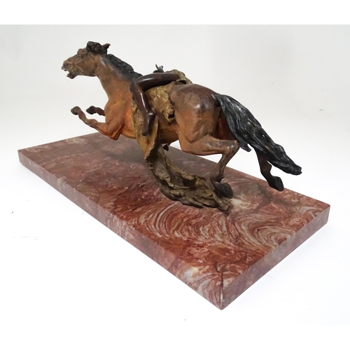 346 - A late 20thC model of a Native American on horseback. Approx. 13 1/2