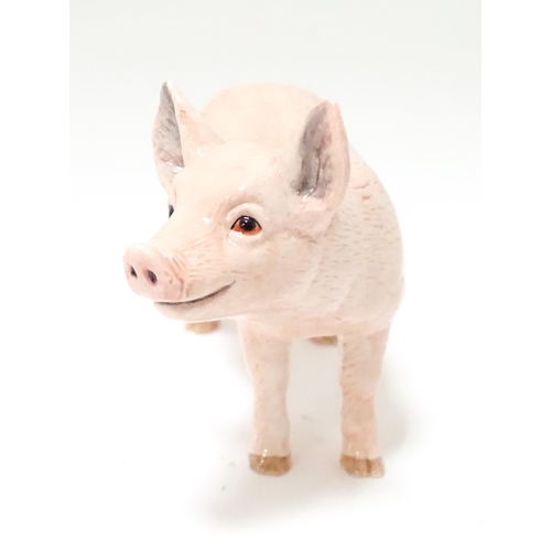 536 - A boxed John Beswick model of a white piglet. Pig approx. 4 1/2