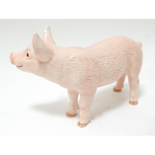 536 - A boxed John Beswick model of a white piglet. Pig approx. 4 1/2