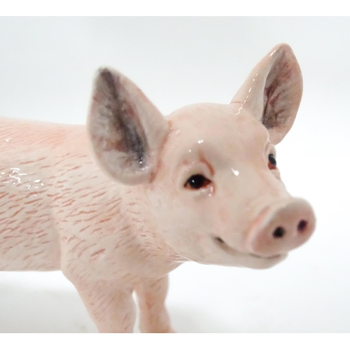 536 - A boxed John Beswick model of a white piglet. Pig approx. 4 1/2