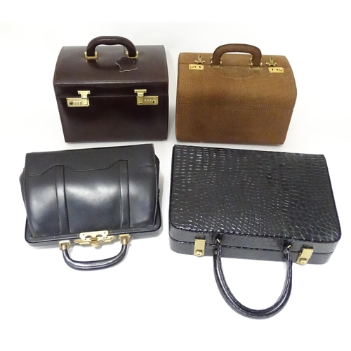 698 - Three mid to late 20thC vanity cases together with a mid 20thC leather handbag, the largest approx 1... 