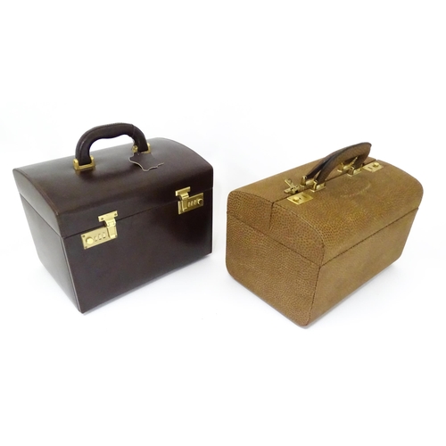 698 - Three mid to late 20thC vanity cases together with a mid 20thC leather handbag, the largest approx 1... 