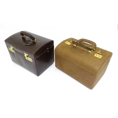 698 - Three mid to late 20thC vanity cases together with a mid 20thC leather handbag, the largest approx 1... 