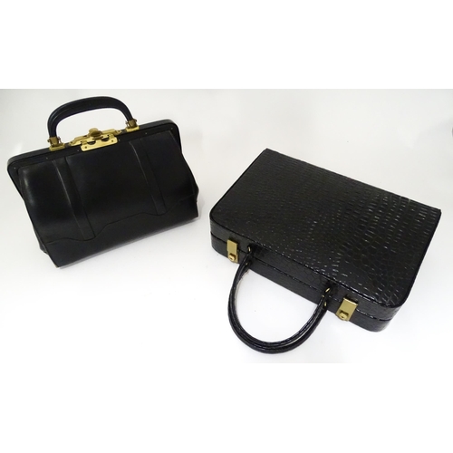 698 - Three mid to late 20thC vanity cases together with a mid 20thC leather handbag, the largest approx 1... 