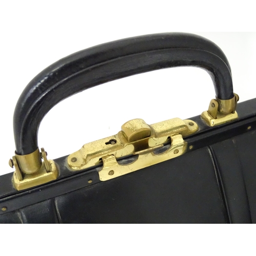 698 - Three mid to late 20thC vanity cases together with a mid 20thC leather handbag, the largest approx 1... 