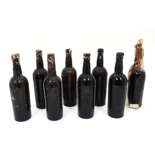 31 - A quantity of assorted bottles and part bottles of vintage port, to include Warre 1960 and Adams 196... 