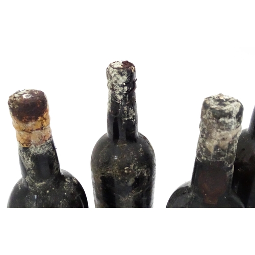 31 - A quantity of assorted bottles and part bottles of vintage port, to include Warre 1960 and Adams 196... 