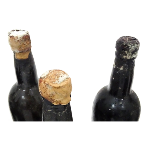 31 - A quantity of assorted bottles and part bottles of vintage port, to include Warre 1960 and Adams 196... 