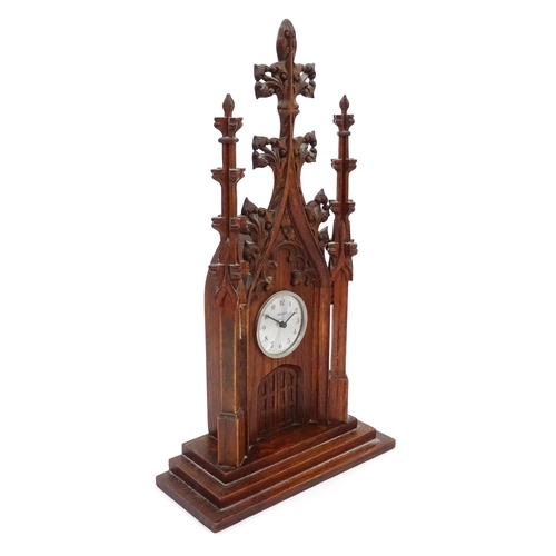 14 - A 20thC oak cased mantle clock of Gothic architectural form, the central dial signed Precista. Appro... 