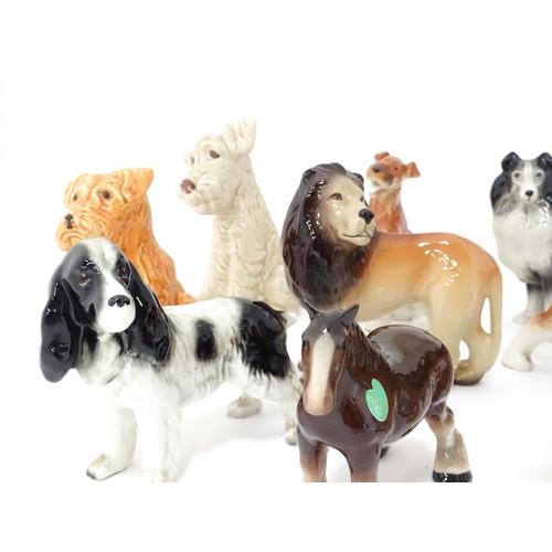 347 - A quantity of assorted ceramic models of dogs to include a Beswick Airedale Terrier - Champion Cast ... 