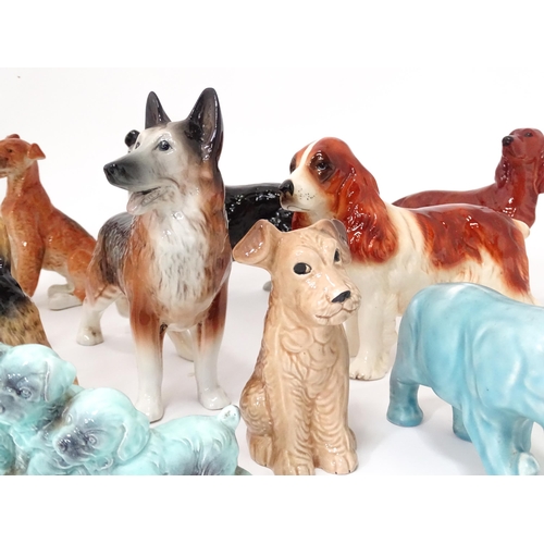 347 - A quantity of assorted ceramic models of dogs to include a Beswick Airedale Terrier - Champion Cast ... 