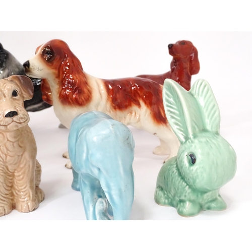 347 - A quantity of assorted ceramic models of dogs to include a Beswick Airedale Terrier - Champion Cast ... 