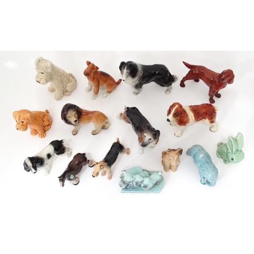 347 - A quantity of assorted ceramic models of dogs to include a Beswick Airedale Terrier - Champion Cast ... 