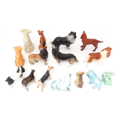 347 - A quantity of assorted ceramic models of dogs to include a Beswick Airedale Terrier - Champion Cast ... 